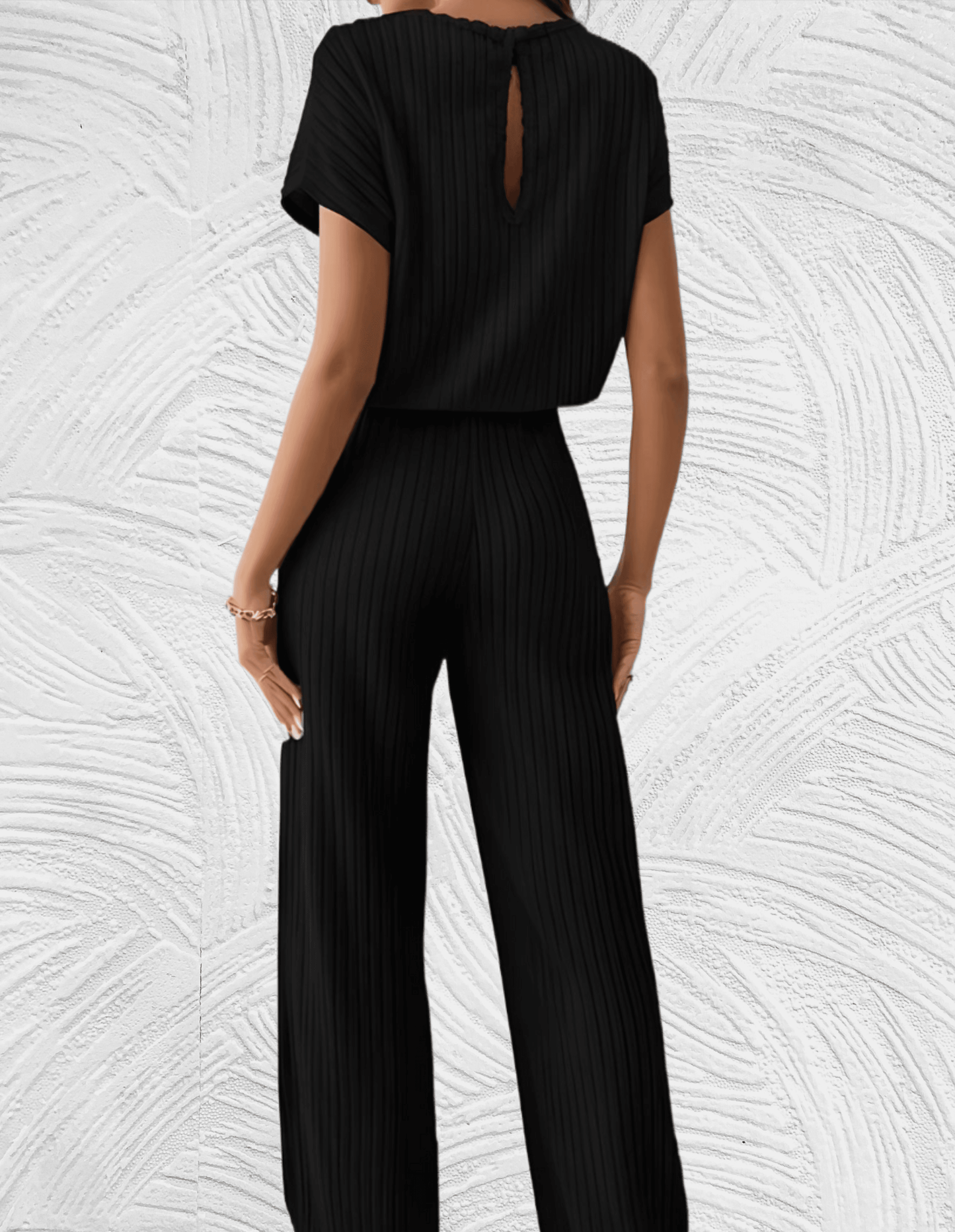 Daria - Strakke en chique jumpsuit met wijde en korte mouwen met geribd dessin - Miller-Mode