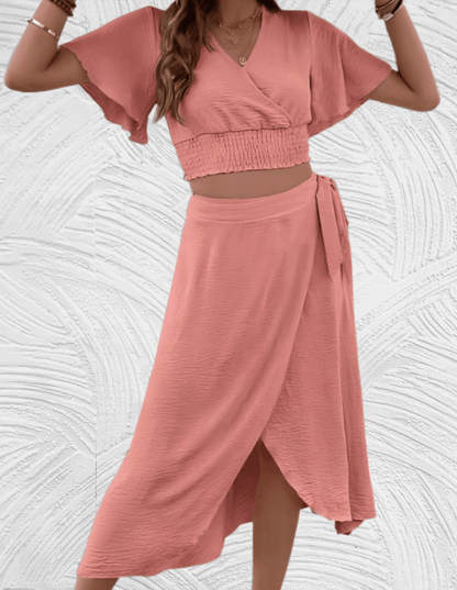 Shanti - 2-delige set met cropped top lage v hals wijde mouwen met bijpassende hoge taille en lange rok met zijsplit - Miller-Mode